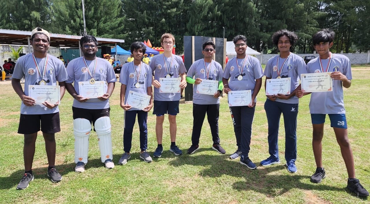 The winning team with their certificates and medals The winning team with their certificates and medals